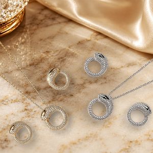 Serpentine Luxe Dual-Tone Zirconia Pendant Set – 14K Gold & Rhodium Plated Designer Necklace and Earrings Set